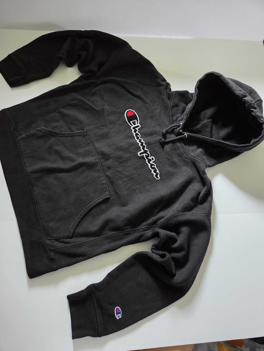 Champion Black Hoodie with Reverse Script Logo